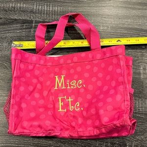 Thirty-one small utility tote.  Pink polka dots.  Green embroidery “Misc. Etc.”